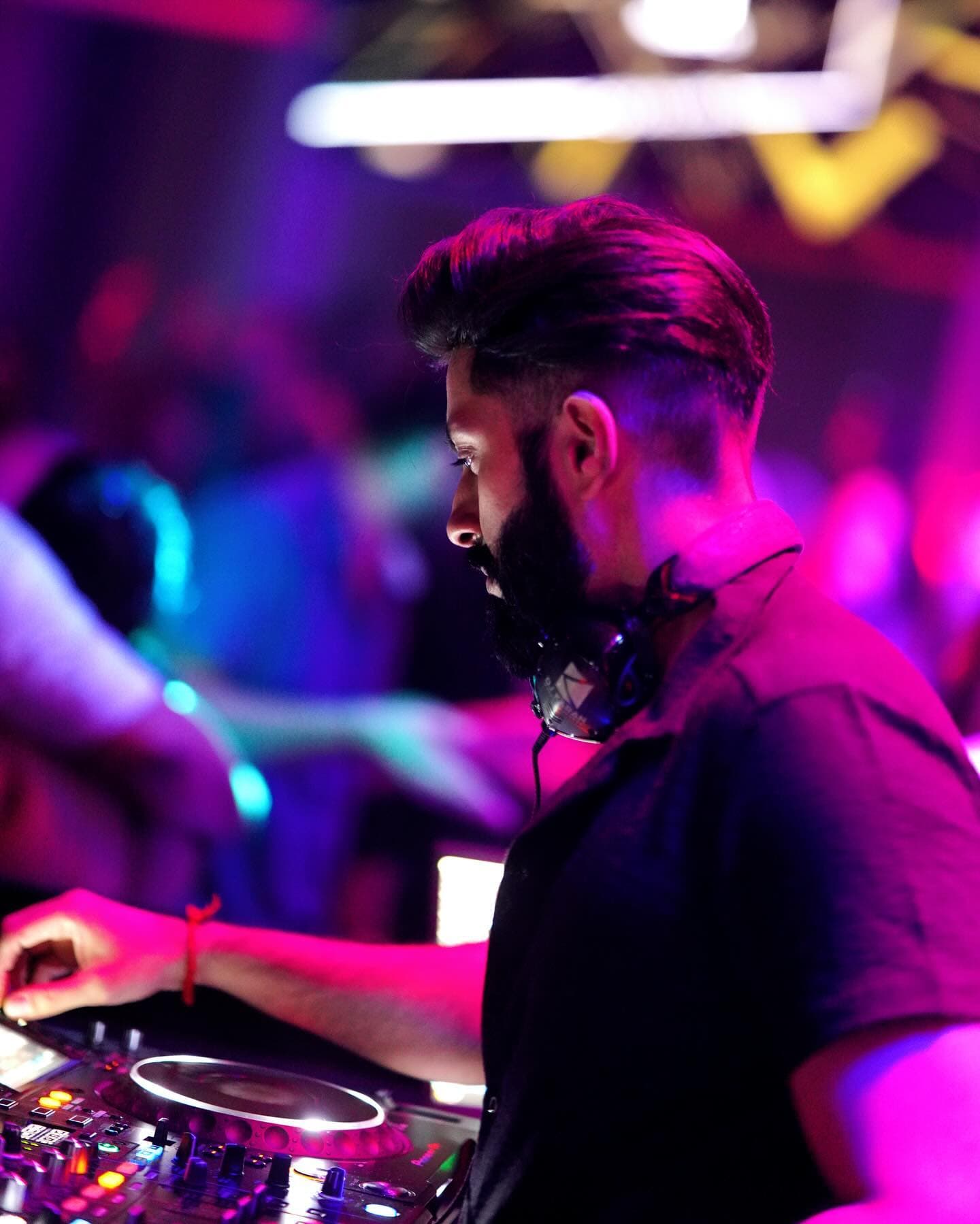 DJ Karan performing at a luxury venue
